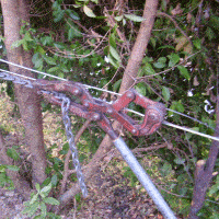 mesh and pipe fence wire strain